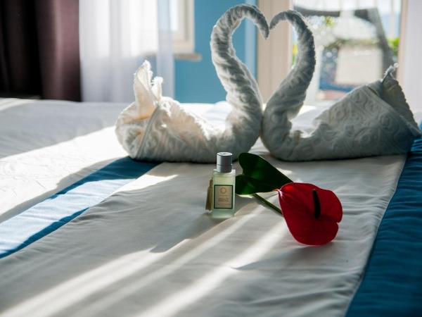 Villa Le Terrazze Charming Rooms : photo 5 de la chambre chambre double avec balcon