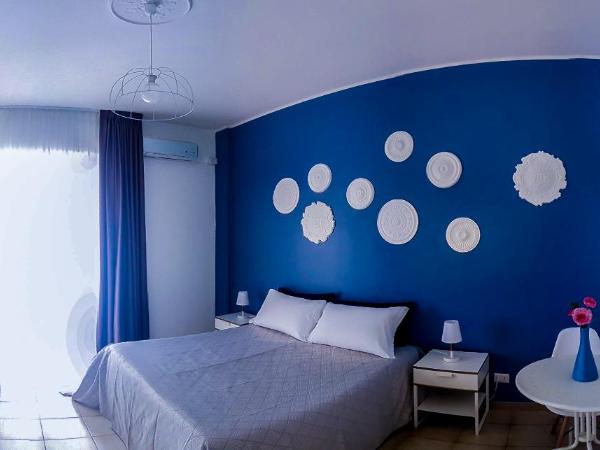 Melo Accommodations : photo 8 de la chambre chambre quadruple avec balcon