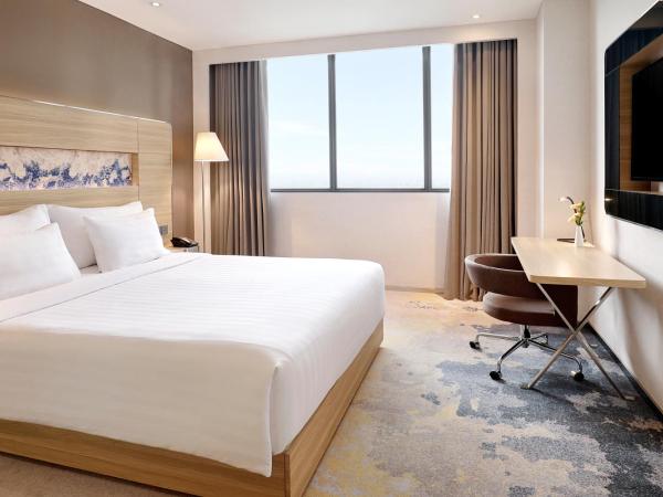 Novotel Samator Surabaya Timur : photo 1 de la chambre chambre lit king-size supérieure