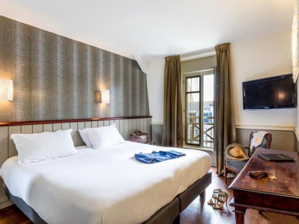 Hôtel Le Beaufort : photo 2 de la chambre chambre double confort avec vue sur rue