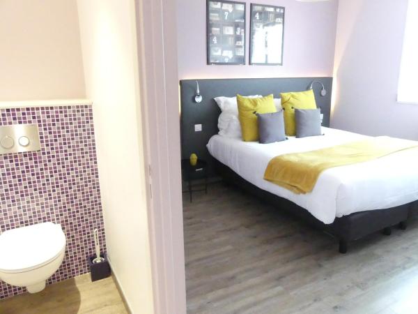 Hôtel de la Plage : photo 2 de la chambre chambre double confort - vue sur ville/jardin