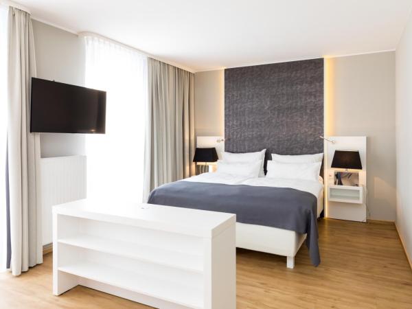 Amedia Luxury Suites Graz, Trademark Collection by Wyndham : photo 4 de la chambre chambre salon - accessible aux personnes à mobilité réduite