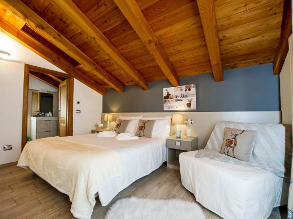 B&B Pousada Rio Aosta-servizi di Bed and breakfast : photo 1 de la chambre chambre supérieure lit queen-size