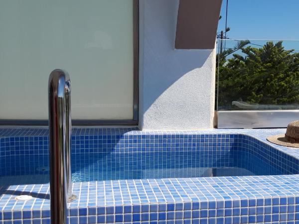 Villa Koronios : photo 7 de la chambre suite lit king-size avec baignoire spa