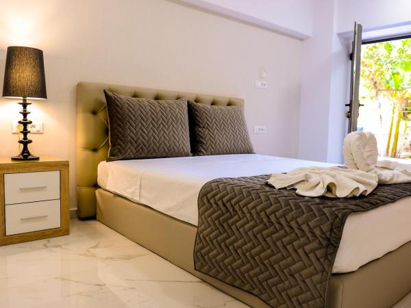 Island Dreams Rooms & Suites : photo 3 de la chambre suite familiale