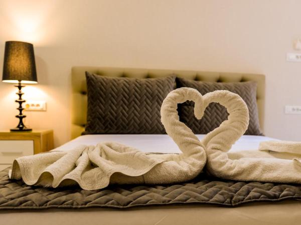 Island Dreams Rooms & Suites : photo 5 de la chambre suite familiale