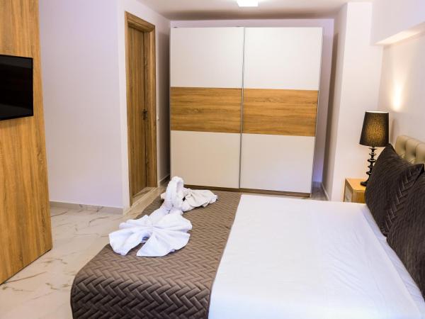 Island Dreams Rooms & Suites : photo 2 de la chambre suite familiale