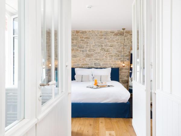 Restaurant Hotel Didier Méril : photo 1 de la chambre suite familiale de luxe avec balcon