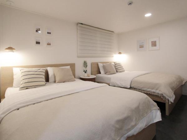 Neat House : photo 4 de la chambre chambre deluxe avec 2 lits queen-size