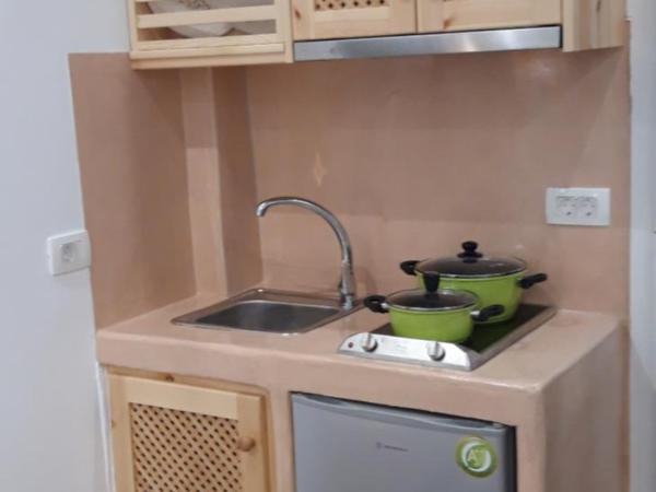 Villa Koronios : photo 1 de la chambre suite lit king-size avec baignoire spa