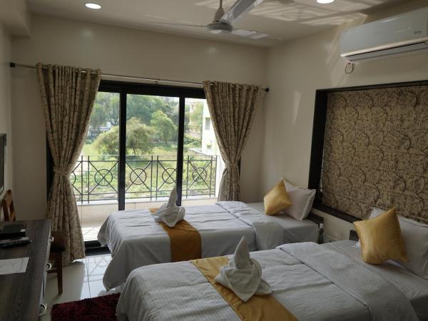 Rama Golden Root New town : photo 7 de la chambre chambre super deluxe avec climatisation