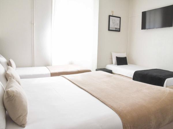 Hotel l'Europe - Cholet Gare : photo 3 de la chambre chambre quadruple avec lits simples
