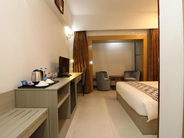 Aristocrat Hotel, New Town, Kolkata : photo 3 de la chambre chambre lit queen-size deluxe