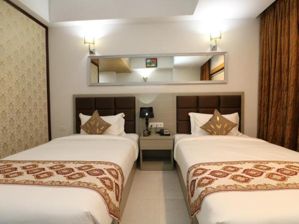 Aristocrat Hotel, New Town, Kolkata : photo 8 de la chambre chambre lits jumeaux deluxe
