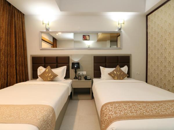 Aristocrat Hotel, New Town, Kolkata : photo 9 de la chambre chambre lits jumeaux deluxe