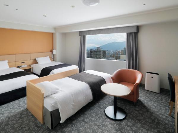 Sapporo Excel Hotel Tokyu : photo 2 de la chambre chambre lits jumeaux supérieure avec lit d'appoint - non-fumeurs - Étage standard
