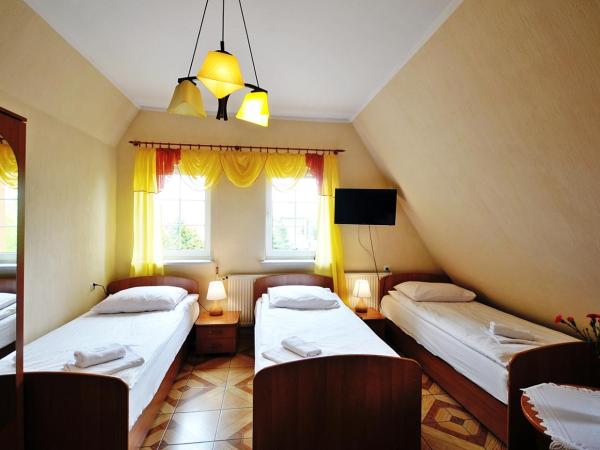Dworek Familijny : photo 2 de la chambre chambre triple