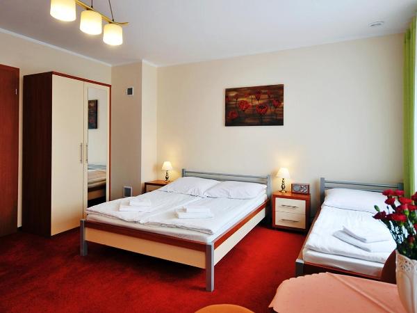 Dworek Familijny : photo 3 de la chambre chambre triple