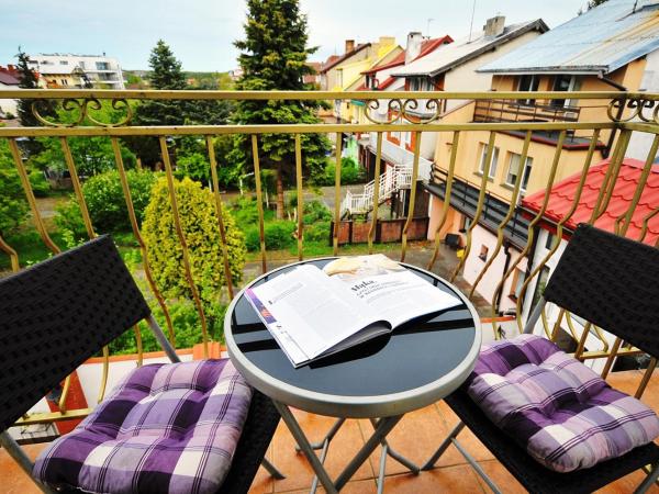 Dworek Familijny : photo 3 de la chambre chambre double avec balcon