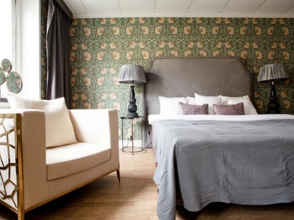 Centric Hotel : photo 9 de la chambre chambre lit king-size familiale