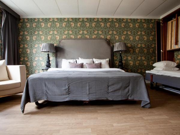 Centric Hotel : photo 7 de la chambre chambre quadruple