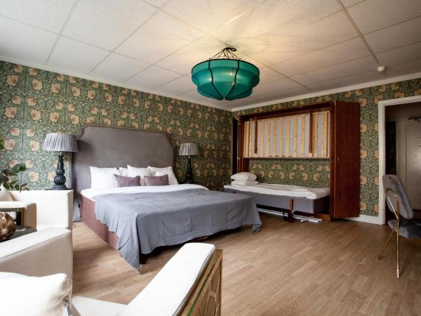 Centric Hotel : photo 6 de la chambre chambre lit king-size familiale