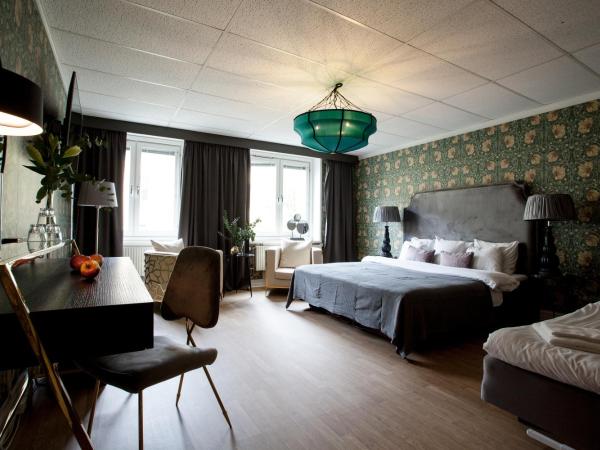 Centric Hotel : photo 8 de la chambre chambre lit king-size familiale