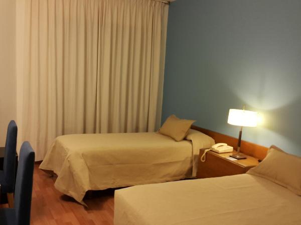 Hotel Avenida : photo 4 de la chambre chambre triple