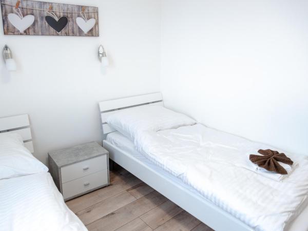 Vivien Szálló : photo 3 de la chambre petite chambre lits jumeaux