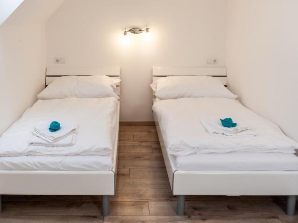 Vivien Szálló : photo 1 de la chambre chambre 2 lits king-size