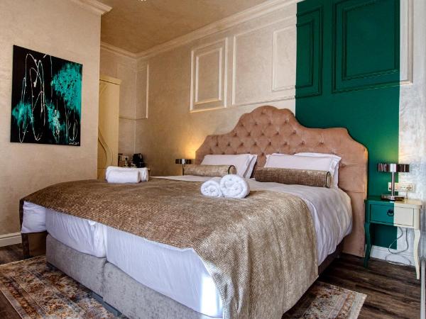 Riva Palace - design rooms : photo 8 de la chambre chambre deluxe double ou lits jumeaux