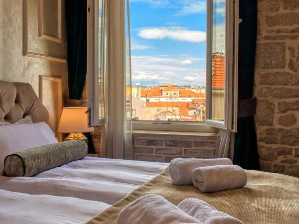 Riva Palace - design rooms : photo 5 de la chambre chambre deluxe double ou lits jumeaux