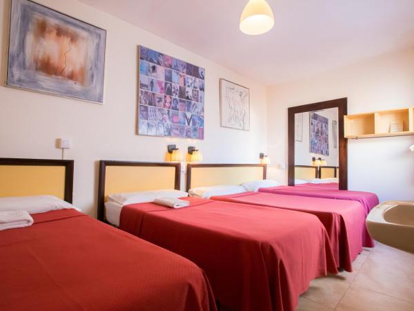 Nuevo Suizo : photo 4 de la chambre chambre quadruple avec salle de bains commune