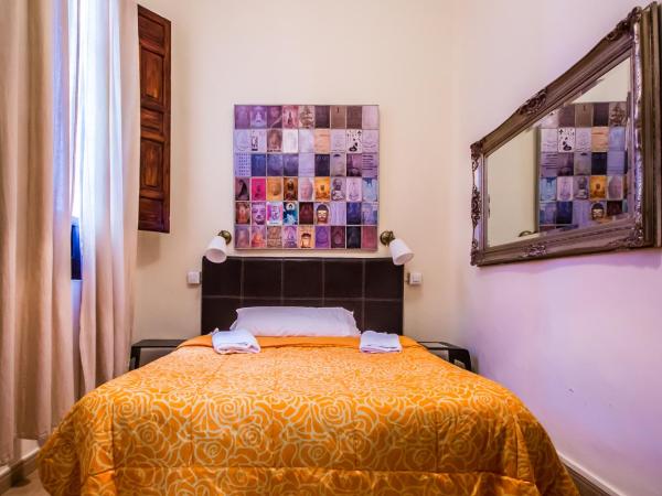 Nuevo Suizo : photo 2 de la chambre chambre double ou lits jumeaux avec salle de bains commune