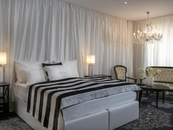 Erla Villa : photo 4 de la chambre chambre supérieure lit queen-size