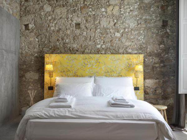 ISONZO SUITES : photo 4 de la chambre chambre lit king-size deluxe