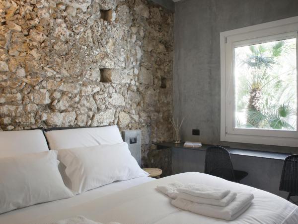 ISONZO SUITES : photo 4 de la chambre chambre double deluxe avec baignoire