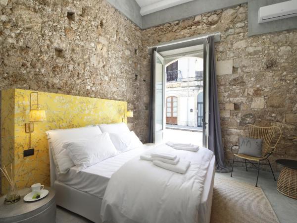 ISONZO SUITES : photo 5 de la chambre chambre lit king-size deluxe