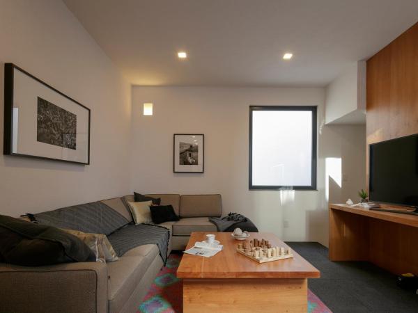 SUITES EVERNESS : photo 4 de la chambre maison 2 chambres