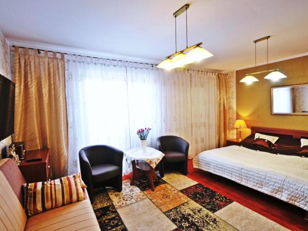 Dworek Familijny : photo 2 de la chambre chambre double avec balcon