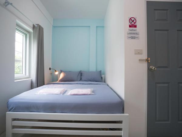 Dhub Hostel Donmueng : photo 3 de la chambre chambre triple basique
