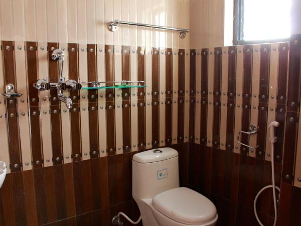 Hotel Vajra Inn & Apartments : photo 7 de la chambre chambre deluxe double ou lits jumeaux