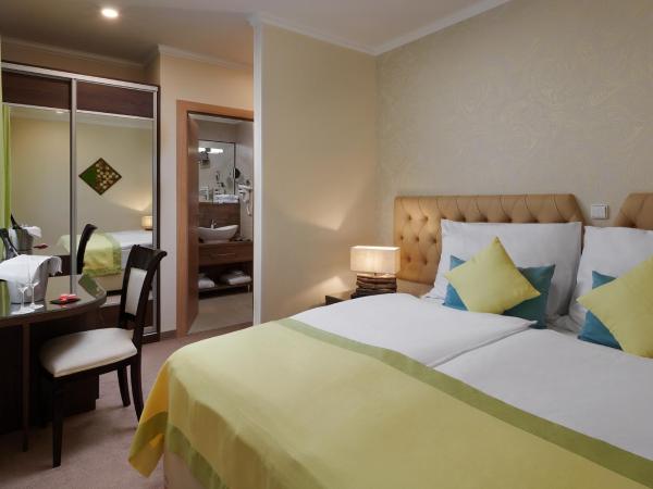 Honour and Grace Hotel : photo 1 de la chambre chambre double ou lits jumeaux