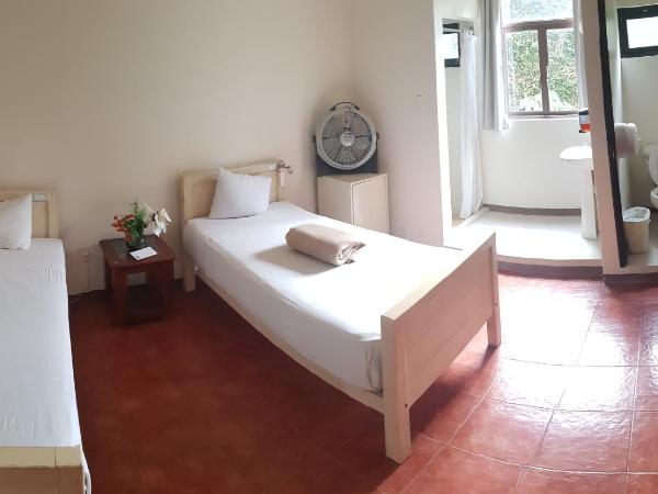 Hostal de Las Américas : photo 7 de la chambre chambre lits jumeaux