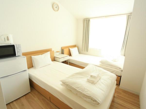 コインズホステル天神ペット宿泊可 : photo 5 de la chambre chambre lits jumeaux deluxe