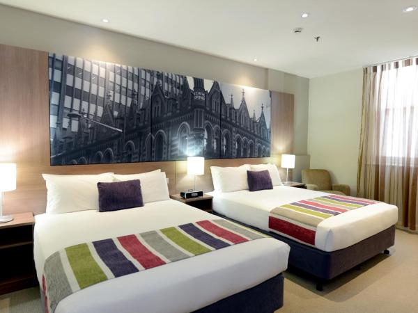 Grosvenor Hotel Adelaide : photo 2 de la chambre chambre lits jumeaux supérieure avec 2 lits queen-size