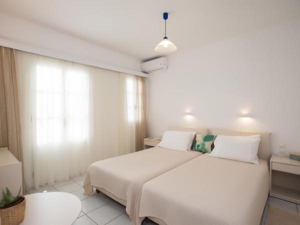 Hotel Charissi : photo 3 de la chambre chambre lits jumeaux - vue sur jardin