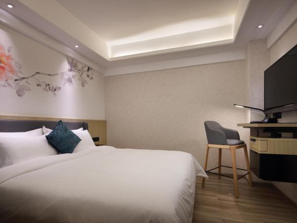 Paco Hotel Jiangtai Lu Metro Guangzhou ---Free Shuttle Bus For CantonFair : photo 1 de la chambre superior kingbed room