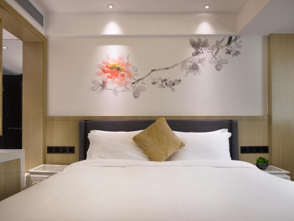 Paco Hotel Jiangtai Lu Metro Guangzhou ---Free Shuttle Bus For CantonFair : photo 2 de la chambre executive kingbed room