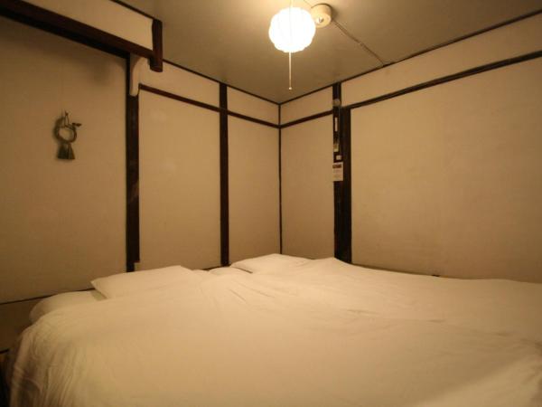HARUYA Umekoji : photo 3 de la chambre chambre lits jumeaux - vue sur jardin